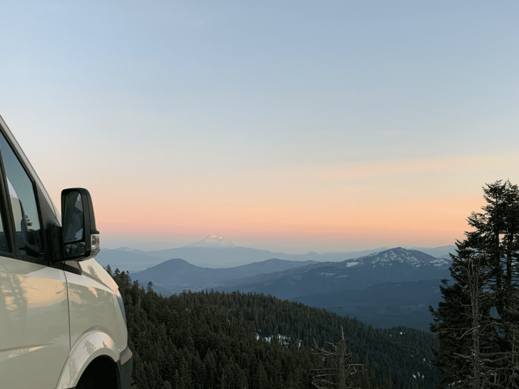 The van in the Cascades viewing Mount Shasta at sunset