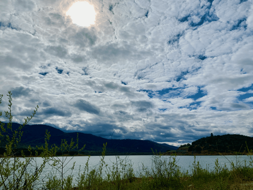 Stratocumulus clouds over the Rogue Valley in Jackson County Oregon with Emigrant Lake in the background